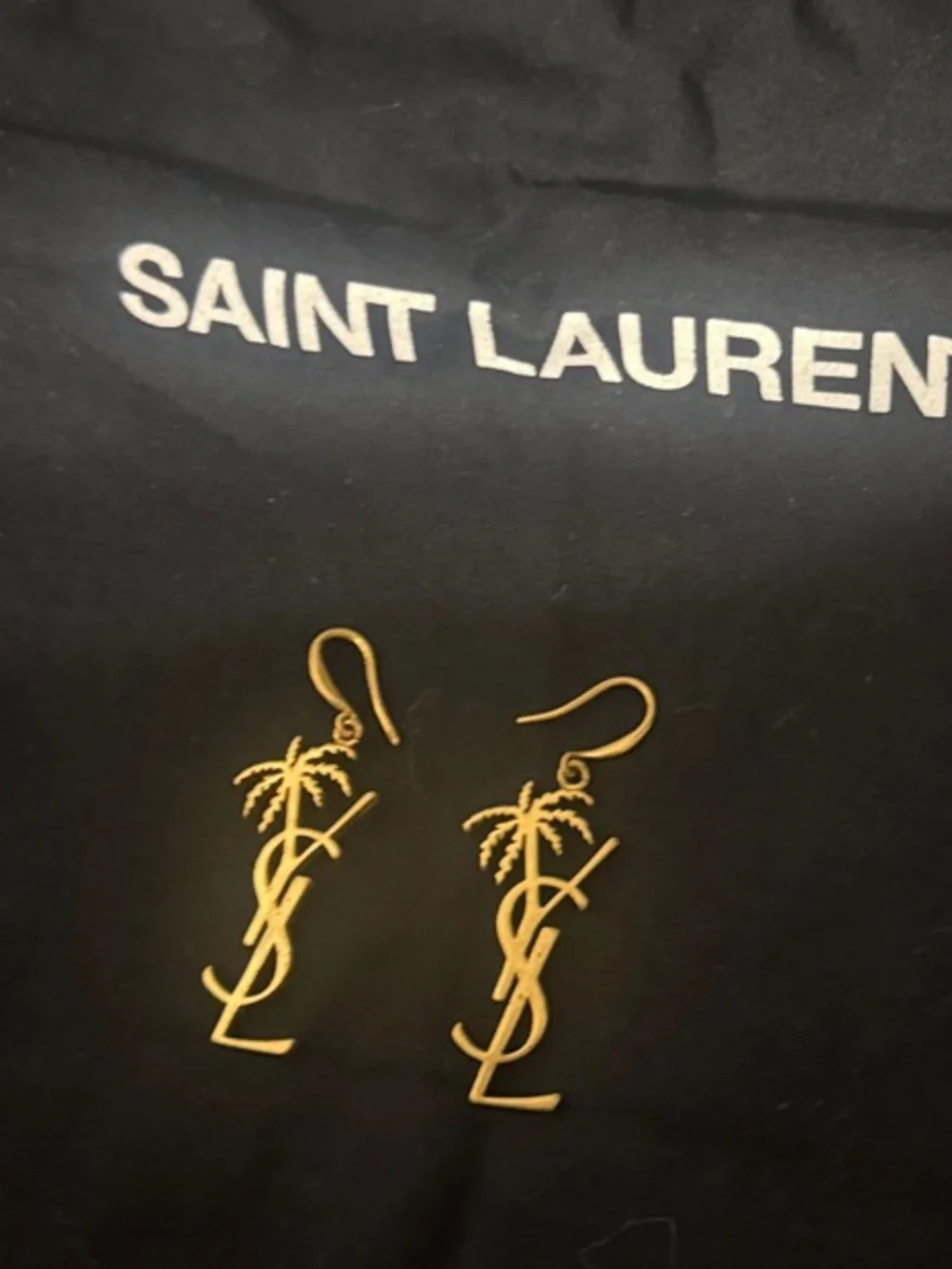 YSL palm tree earrings tropical gold